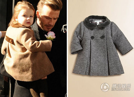 小七穿Marie Chantal驼色大衣依偎在爸爸怀里，大衣高腰线的设计更显出宝贝的浑圆可爱。