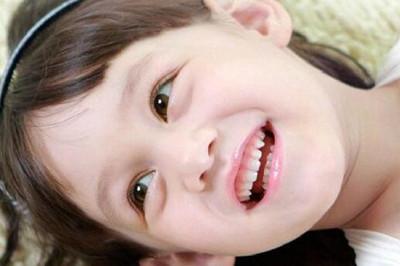 儿童牙齿没掉后面又长新牙是什么原因