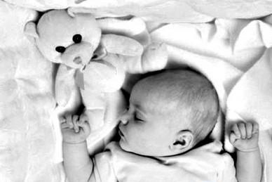 宝宝总是歪头睡觉是怎么回事